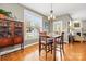 Charming breakfast nook with wood table and hardwood floors at 14108 Tooley St, Huntersville, NC 28078