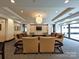 Relaxing lounge area with plush sofas and a TV at 230 S Tryon St # 205, Charlotte, NC 28202