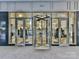 Building entrance with revolving doors at 230 S Tryon St # 205, Charlotte, NC 28202