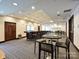 Community bar with seating and a sleek design at 230 S Tryon St # 205, Charlotte, NC 28202
