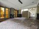 Elegant building entrance with double doors and brick walkway at 230 S Tryon St # 205, Charlotte, NC 28202