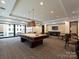 Well-lit game room featuring a pool table at 230 S Tryon St # 205, Charlotte, NC 28202