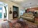 Modern living room with comfortable seating and stylish rug at 230 S Tryon St # 205, Charlotte, NC 28202