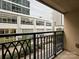 City view from private balcony, showcasing modern urban architecture at 230 S Tryon St # 205, Charlotte, NC 28202