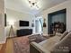 Spacious living room featuring contemporary decor and a cozy atmosphere at 230 S Tryon St # 205, Charlotte, NC 28202