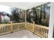 Wooden deck overlooking a wooded backyard at 606 Berkshire Dr, Statesville, NC 28677