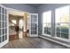 Home office with French doors and hardwood floors at 9693 Brandybuck Nw Dr, Charlotte, NC 28269