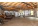 Unfinished basement area with storage and gym at 9693 Brandybuck Nw Dr, Charlotte, NC 28269