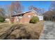 Brick ranch home with a long driveway at 1869 Emma Cir, Lancaster, SC 29720