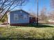 View of a blue-sided addition to a brick home at 1869 Emma Cir, Lancaster, SC 29720