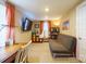 Versatile bedroom with a futon, large TV, and ample storage at 402 W 7Th St, Newton, NC 28658