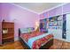 Bedroom with double bed, large closet, and built in shelves at 402 W 7Th St, Newton, NC 28658