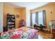 bedroom with twin bed, desk, and built-in shelving at 402 W 7Th St, Newton, NC 28658