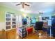 Home office with built-in shelving and a large desk at 402 W 7Th St, Newton, NC 28658