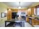 Kitchen with wood cabinets, stainless steel appliances, and an island at 402 W 7Th St, Newton, NC 28658