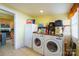 Laundry room with washer, dryer, and kitchen view at 402 W 7Th St, Newton, NC 28658