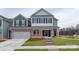 Two-story townhome with gray siding and stone accents at 4356 Bronze Blvd, Sherrills Ford, NC 28673