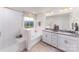 Elegant bathroom with double vanity, soaking tub, and walk-in shower at 4356 Bronze Blvd, Sherrills Ford, NC 28673