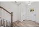 Bright and airy foyer with hardwood floors and a staircase at 655 District Ct # 18, Fort Mill, SC 29708