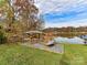 Community boat dock with kayak storage on the lake at 129 Coronilla Rd, Mooresville, NC 28117