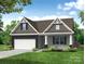 Craftsman-style home with stone accents and two-car garage at 130 N Prestwick Way # 15, Mooresville, NC 28115