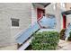 Building exterior with red door and modern metal railings at 2044 Atherton Heights Ln, Charlotte, NC 28203