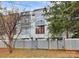 Modern three-story building with metal fence and landscaping at 2044 Atherton Heights Ln, Charlotte, NC 28203