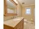 Updated bathroom with granite vanity and tiled floor at 3113 Old Pageland Marshville Rd, Wingate, NC 28174