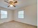 Bedroom with two windows and ceiling fan at 3113 Old Pageland Marshville Rd, Wingate, NC 28174