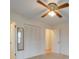 Bedroom with ceiling fan, closet and access to bathroom at 3113 Old Pageland Marshville Rd, Wingate, NC 28174
