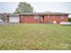 Brick ranch house with attached garage and spacious yard at 3113 Old Pageland Marshville Rd, Wingate, NC 28174
