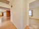 Bright hallway with wood floors, leading to kitchen and living areas at 3113 Old Pageland Marshville Rd, Wingate, NC 28174
