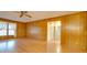 Living room with hardwood floors and hallway access at 3113 Old Pageland Marshville Rd, Wingate, NC 28174