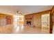 Living room with brick fireplace and access to kitchen at 3113 Old Pageland Marshville Rd, Wingate, NC 28174