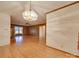 Living room features wood paneled walls and hardwood floors at 3113 Old Pageland Marshville Rd, Wingate, NC 28174