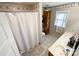 Bathroom with shower, double vanity, and linen cabinet at 5425 Creekwood Dr, Salisbury, NC 28147