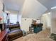 Cozy bonus room with seating area and storage at 5425 Creekwood Dr, Salisbury, NC 28147