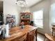 Dining area with wooden table and chairs, and built-in hutch at 5425 Creekwood Dr, Salisbury, NC 28147