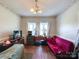 Small dining room with wood floors, window seat, and a couch at 5425 Creekwood Dr, Salisbury, NC 28147