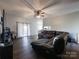 Spacious living room with a large sectional sofa and hardwood floors at 5425 Creekwood Dr, Salisbury, NC 28147