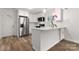 Modern kitchen with stainless steel appliances and an island at 647 Simpson St, Rock Hill, SC 29730