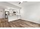 Spacious living area with hardwood floors and open kitchen at 647 Simpson St, Rock Hill, SC 29730