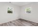 Bright bedroom with two windows and wood-look laminate flooring at 647 Simpson St, Rock Hill, SC 29730