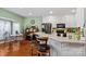 Modern kitchen with white cabinets, granite counters, and stainless steel appliances at 6650 Long Branch Rd, Salisbury, NC 28147