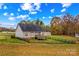 Tan house with deck and fenced backyard at 6650 Long Branch Rd, Salisbury, NC 28147