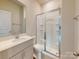 Clean bathroom with a shower stall, toilet and vanity with a quartz countertop at 913 Smithcliffs Trl, York, SC 29745