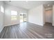 Bright living room with hardwood floors and sliding glass doors to patio at 913 Smithcliffs Trl, York, SC 29745