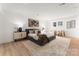 Main bedroom with plush bed, neutral tones, and an area rug at 200 Kimrod Ln, Charlotte, NC 28270