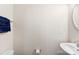Simple and clean bathroom with white sink, vanity, and dark blue towels at 2016 Tupelo Grove Ln, Gastonia, NC 28054