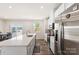 Open concept kitchen with stainless steel appliances and an island at 2016 Tupelo Grove Ln, Gastonia, NC 28054
